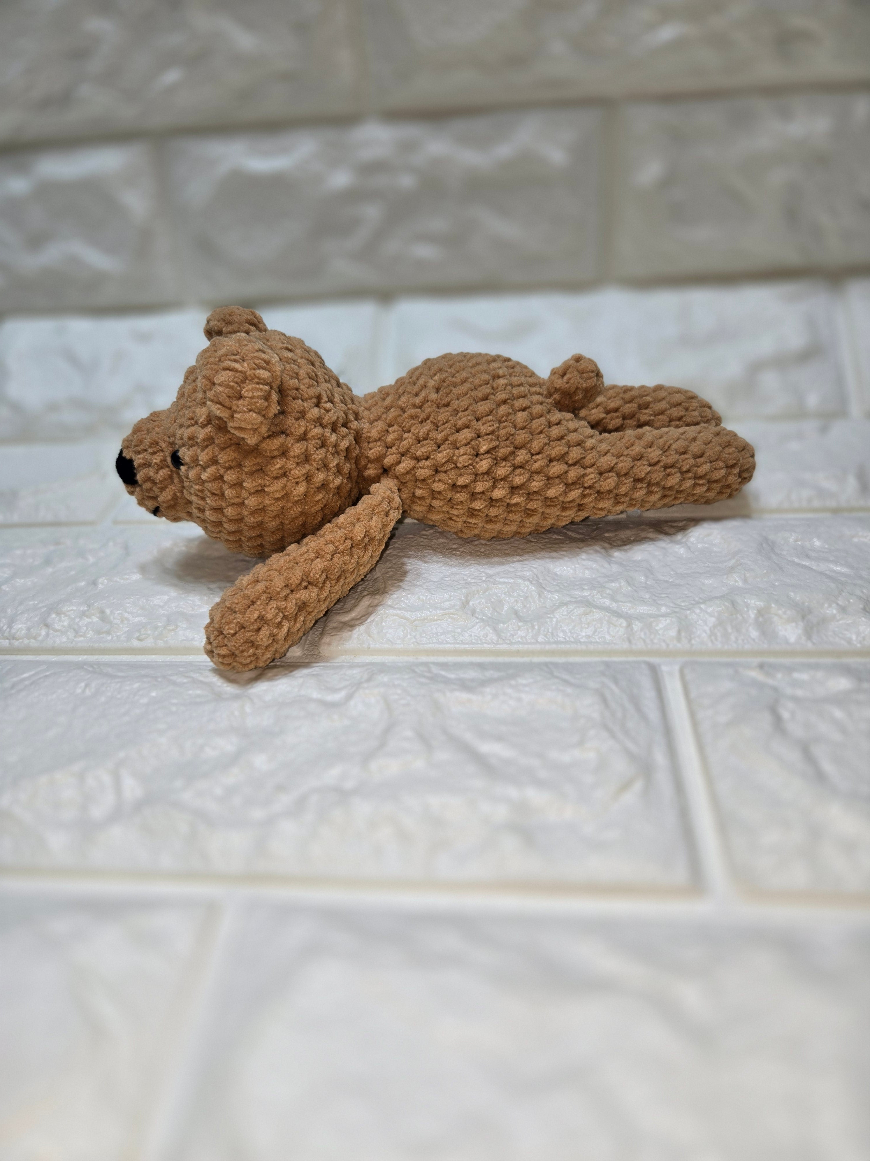 Crochet laying bear pattern