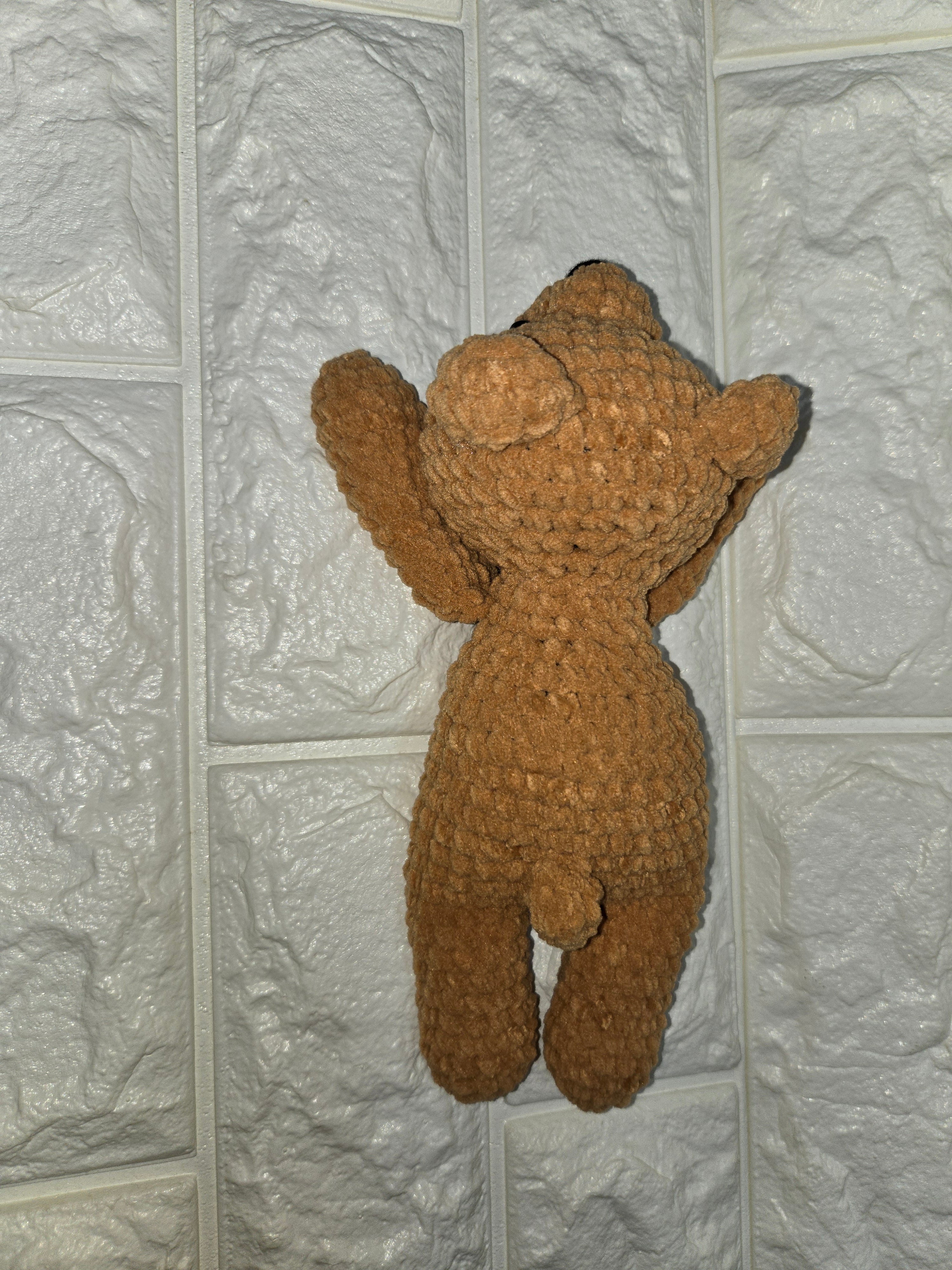 Crochet laying bear pattern