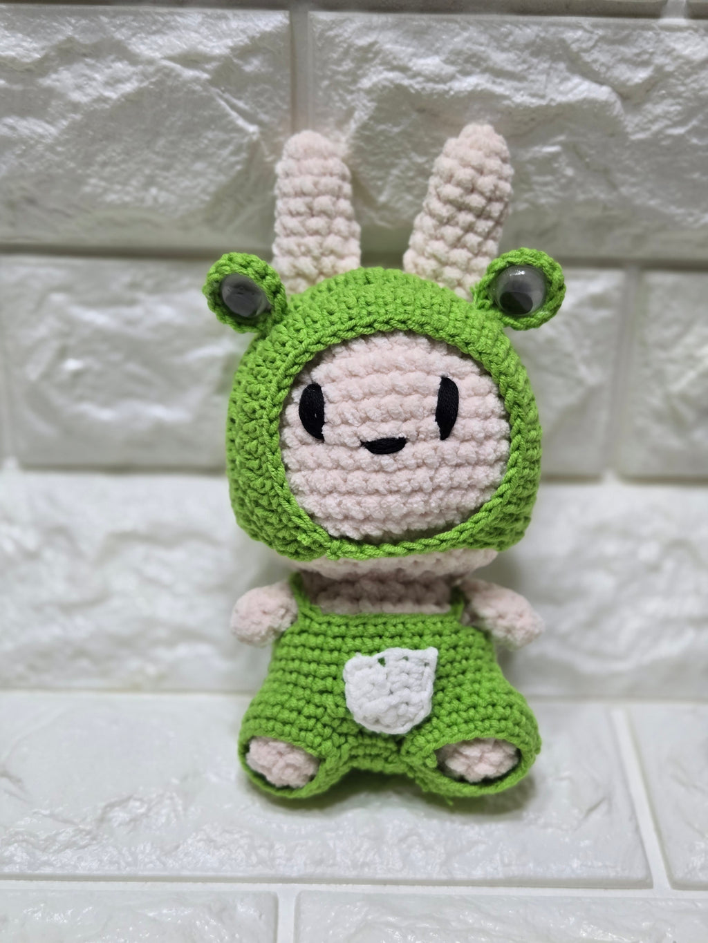 Crochet Kiki's froggy suit pattern